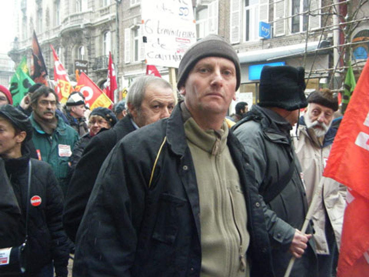 Olivier (center) in the march